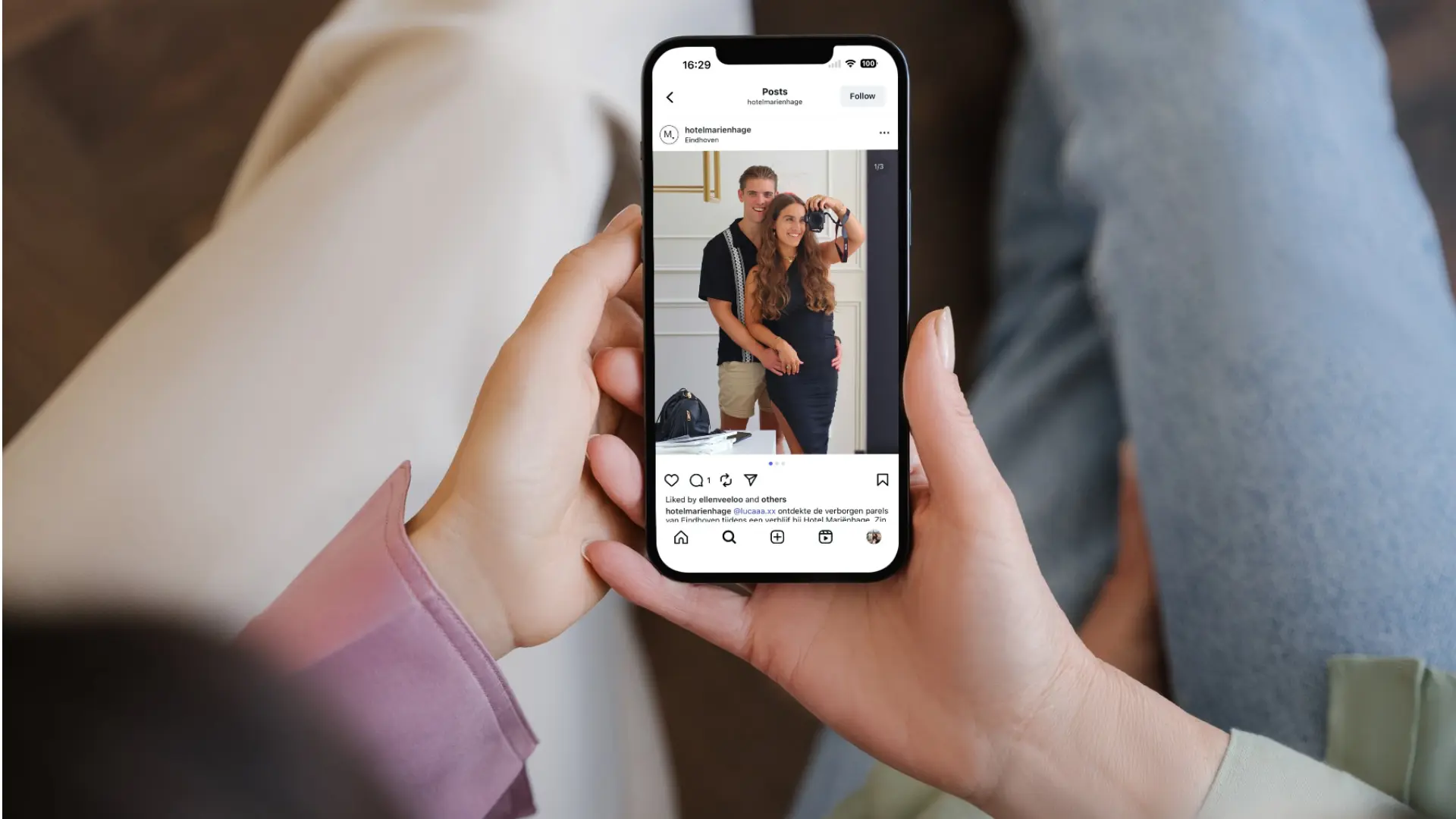 A smiling couple's selfie illustrates effective hotel sales strategies using UGC (user-generated content) marketing.